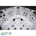 Vollständige Innenansicht des FinA Xaluna Outdoor Whirlpools mit drei Sitzplätzen und zwei Liegeflächen, ausgestattet mit zahlreichen Massagedüsen und ergonomischen Kopfstützen.
