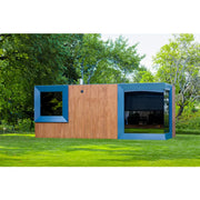 Genevas Zürich Modular Sauna mit blauem Rahmen und Holzverkleidung im Garten