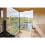 Genevas Zermatt Sauna Innenraum mit Holzbänken und großem Fenster zum See