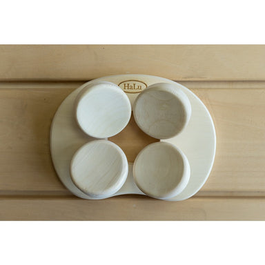 Halu Sauna Round Kopfstütze aus hellem Aspen-Holz – ergonomisches Design für Saunaliegen.