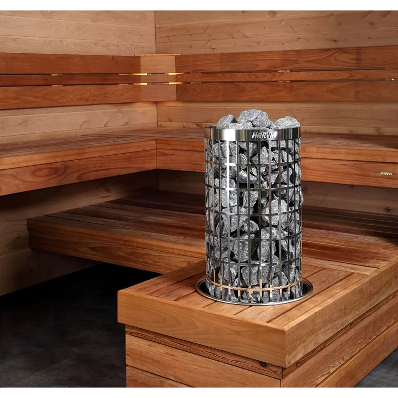 Harvia Cilindro Elektro Saunaofen mit Schutzkorb und Steinen in finnischer Sauna mit Holzbänken