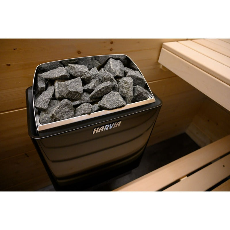 Nahaufnahme des Harvia KIP Saunaofens mit naturbelassenen Saunasteinen in modernem Design