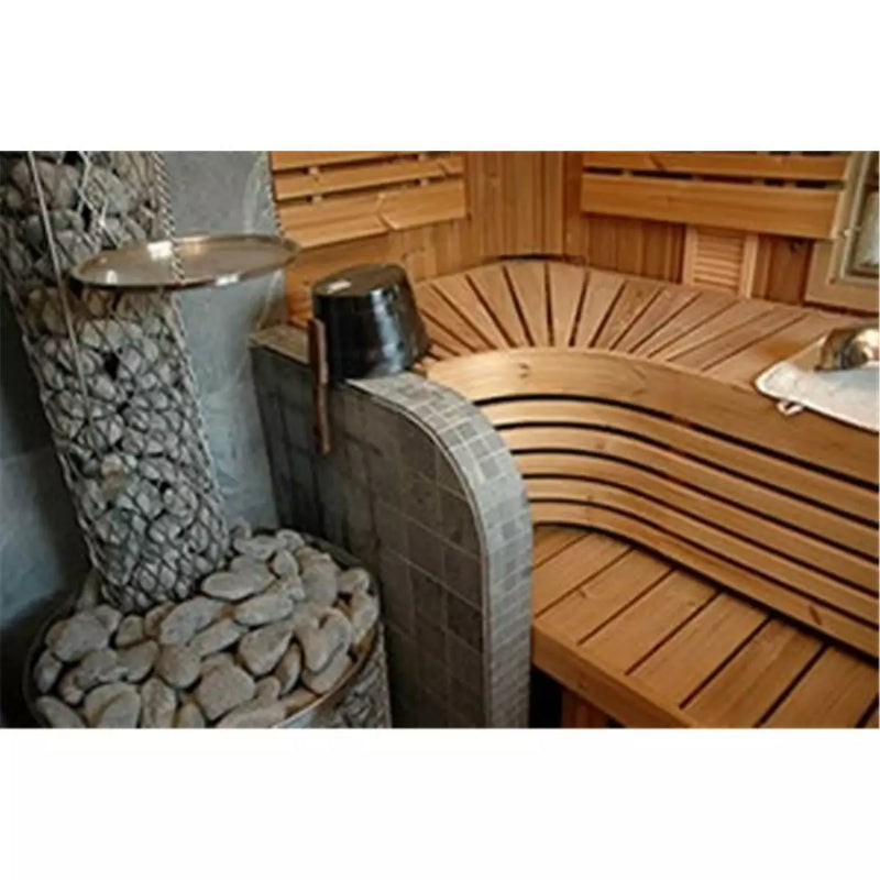 Harvia Legend 300 Holz Saunaofen in klassischer Saunaanlage mit Holzbänken, Saunasteinen und Wasserkübel