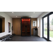 Hekla IR 100 Infrarotsauna 100x120 mit roter Beleuchtung in modernem Wellness-Raum integriert
