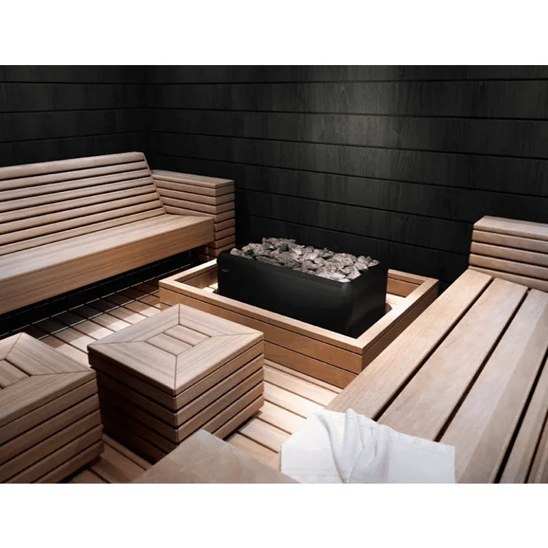 Helo Magma Elektrosaunaofen in moderner Sauna mit Holzbänken und schwarzen Wänden