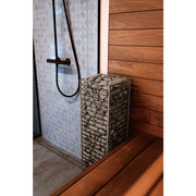 Huum Cliff elektronischer Saunaofen 6/9/10.5 kW Standofen mit Steinen in moderner Sauna