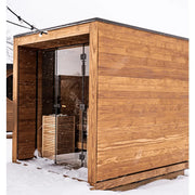 Huum Core Black Saunaofen 6/9/10.5 kW Standofen in moderner Gartensauna aus Holz mit Glastür