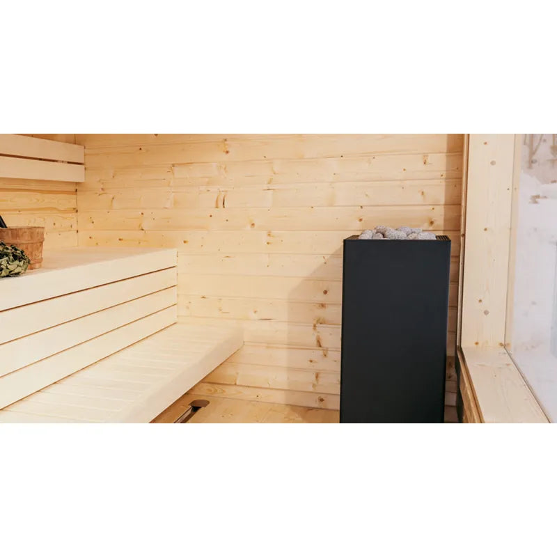 Huum Core Black Saunaofen in schwarzem Design mit Steinen in moderner Holzsauna mit Holzbänken