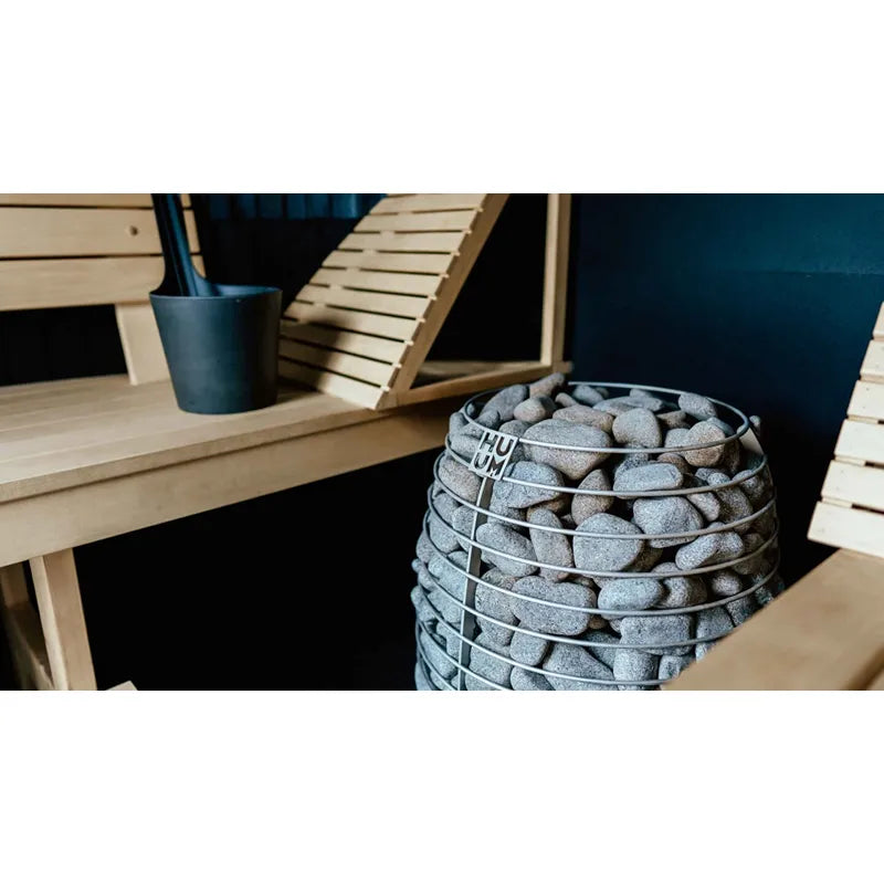 Huum Hive elektrischer Saunaofen 12/15/18 kW Standofen mit Saunasteinen in moderner Sauna