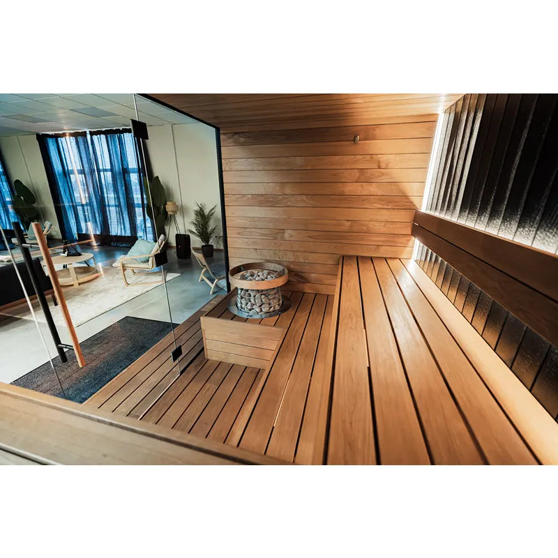 Huum Hive Mini elektrischer Saunaofen 6/9/10.5 kW Standofen in moderner Wellness-Sauna mit Holzbänken