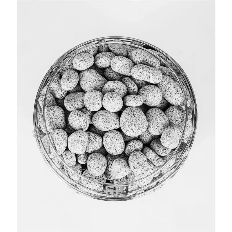 Huum HIVE Mini Saunaofen mit weißen Saunasteinen in transparentem Behälter von oben fotografiert