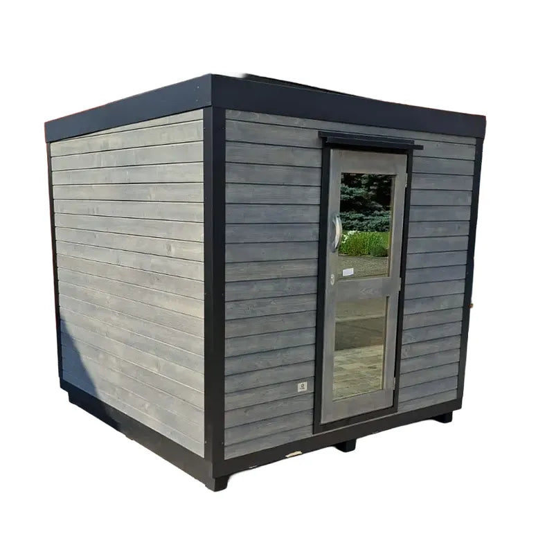 KOBA Block Gartensauna - Modernes Saunahaus mit grauer Holzverkleidung und Glastür