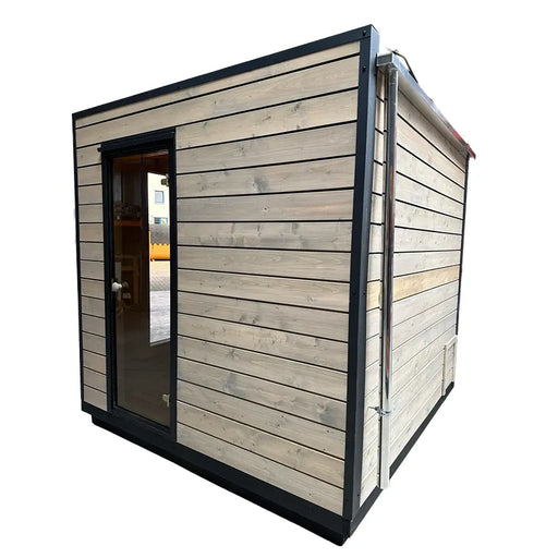 KOBA Cube Gartensauna moderne quadratische Form mit Holzverkleidung und schwarzem Rahmen
