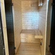 KOBA Cube Gartensauna - Moderne quadratische Form mit Holzbank im Innenraum