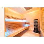 KOBA Cube Gartensauna Innenraum mit Holzbänken und Saunaofen