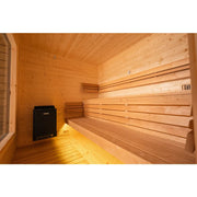 KOBA Cube Gartensauna Innenraum mit Holzbänken und Saunaofen