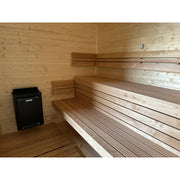 KOBA Cube Gartensauna Innenraum mit Holzbänken und Saunaofen