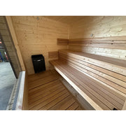 KOBA Cube Gartensauna Innenraum mit Holzbänken und Saunaofen