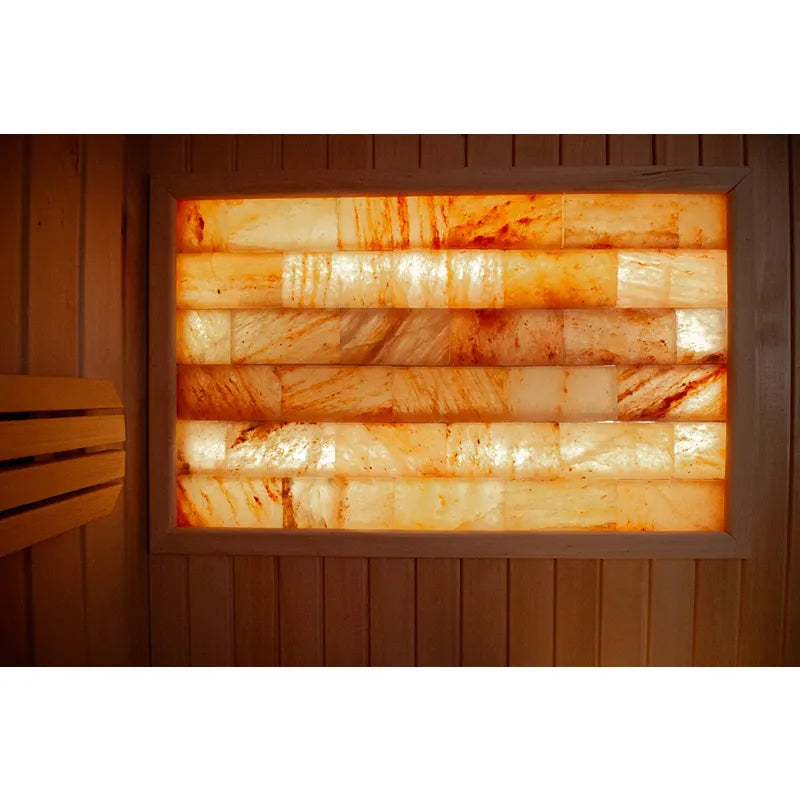 KOBA Fenris Gartensauna - Designsauna Innenraum mit glühend orangem Saunaofen und Holzbänken