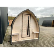 KOBA Iglu Gartensauna mit charakteristischer Iglu-Form, Holzverkleidung und dunklem Dach im Garten