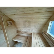KOBA Iglu Gartensauna Innenraum mit Holzbänken und gewölbter Holzdecke