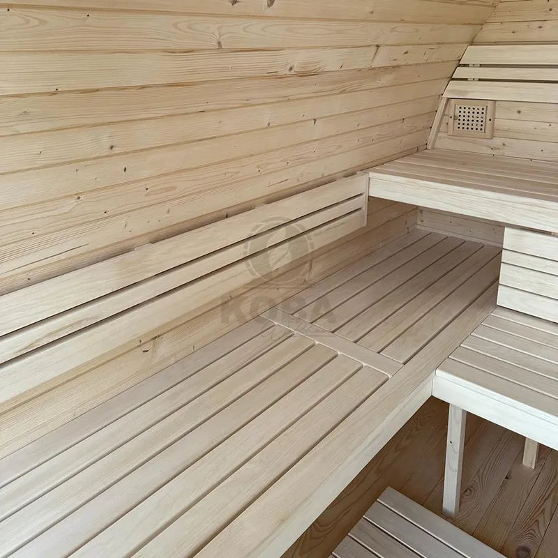 KOBA Iglu Gartensauna Innenraum mit Holzbänken und gewölbter Holzdecke