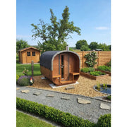KOBA Quadro Gartensauna moderne quadratische Form aus Holz in Gartenanlage mit Liegebereich