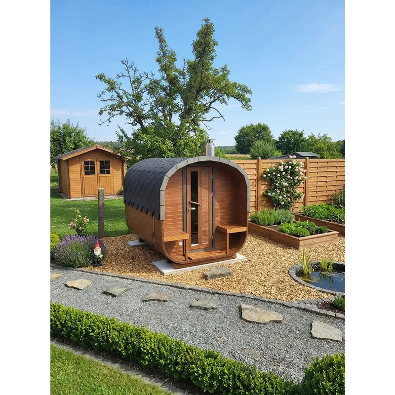 KOBA Quadro Gartensauna moderne quadratische Form aus Holz in Gartenanlage mit Liegebereich