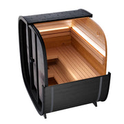 Leil Black Cube Classic Gartensauna 4 Personen mit schwarzem Außengehäuse, geöffnete Tür zeigt Innenraum mit Holzbänken und LED-Beleuchtung