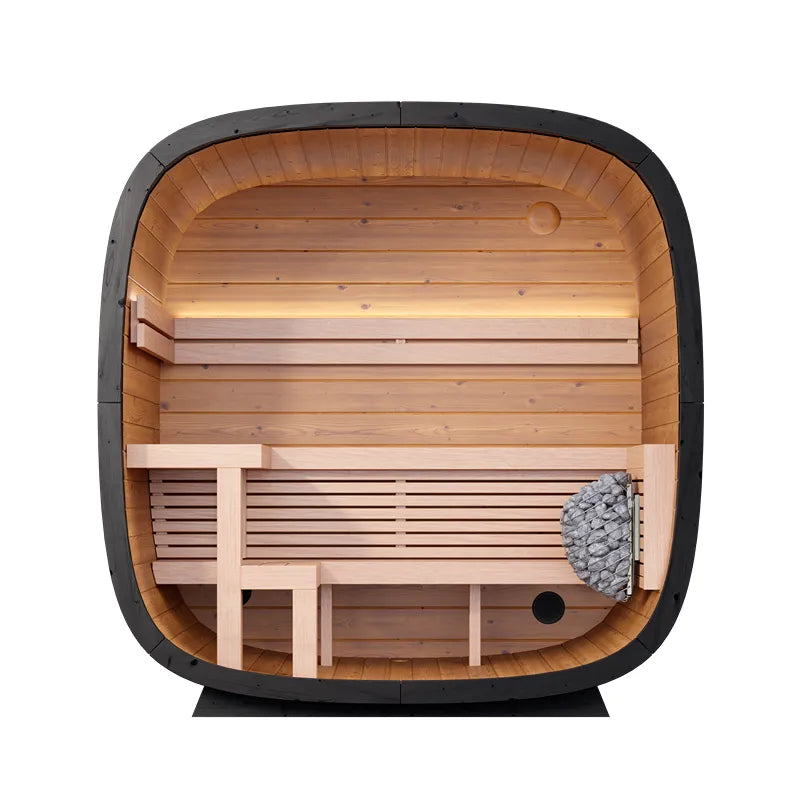 Leil Black Cube Classic Gartensauna 4 Personen Innenansicht mit Holzbänken und Saunaofen