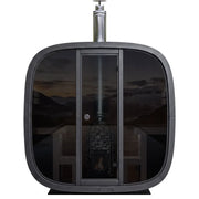 Leil® Black Cube Comfort Gartensauna bis 6 Personen von Leil® Saunas mit schwarzem Kunststoffgehäuse, großen Glaspanelen und Edelstahlkamin
