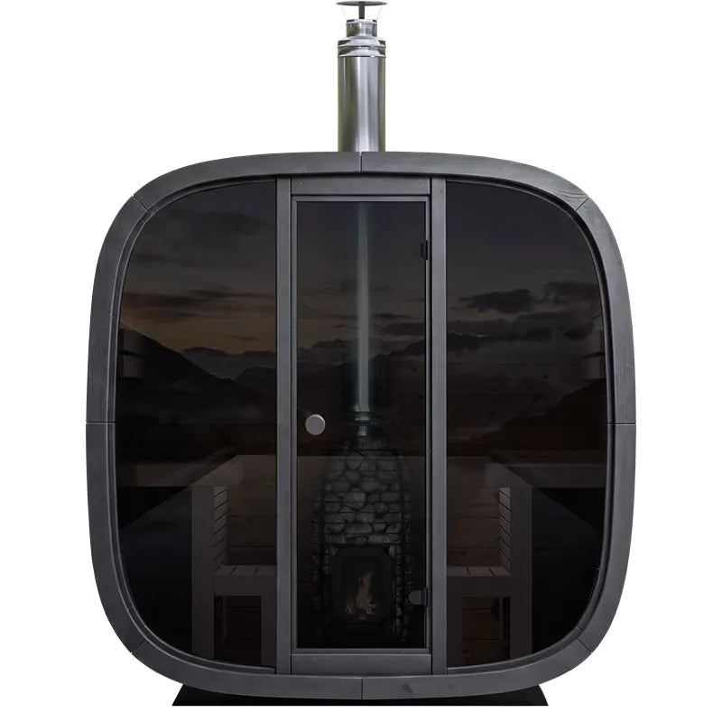 Leil® Black Cube Comfort Gartensauna bis 6 Personen von Leil® Saunas mit schwarzem Kunststoffgehäuse, großen Glaspanelen und Edelstahlkamin