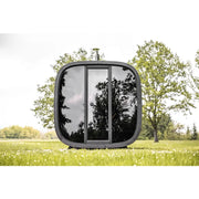 Leil® Black Cube Comfort Gartensauna bis 6 Personen von Leil® Saunas mit schwarzem Kunststoffdesign in Gartenumgebung
