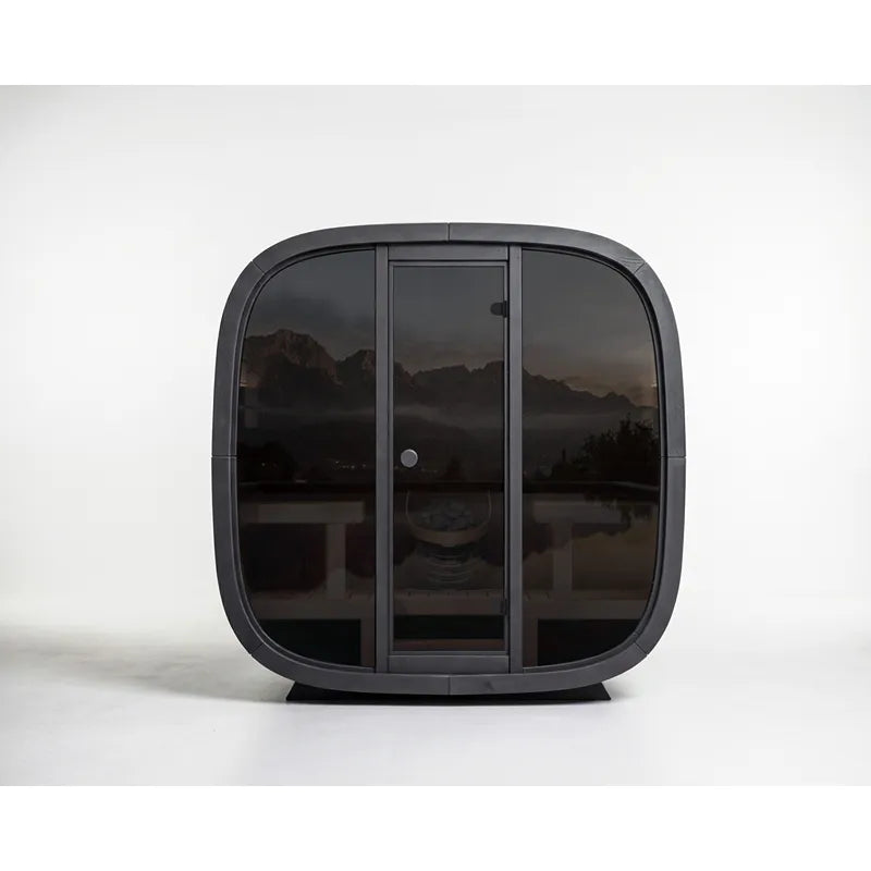 Leil Black Cube Premium Gartensauna Hexagon-Wand mit dunkelgrauem Rahmen und Glastür vor weißem Hintergrund