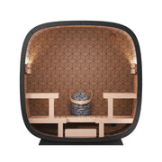 Leil Black Cube Premium Gartensauna mit Hexagon-Wand-Design, Innenansicht mit Holzbänken und Saunaofen