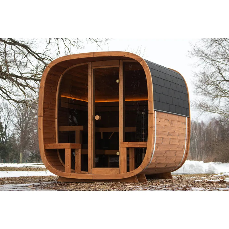 Leil Dice Comfy Gartensauna 4 Personen 2 Räume von Leil Saunas mit Holzfassade und schwarzem Dach im Garten