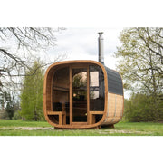 Leil Dice Comfy Gartensauna 4 Personen 2 Räume mit Holzverkleidung und großen Glasfenstern im Garten