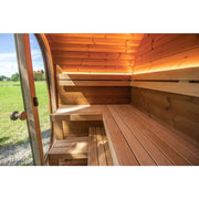 Leil Dice Pocket Gartensauna von Leil Saunas mit Holzbänken, offene Tür zeigt Innenraum im Garten