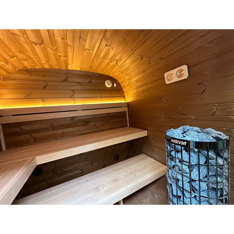 Leil® Dice Solo Gartensauna Innenraum mit zwei Holzbänken, LED-Beleuchtung und Harvia Saunaofen