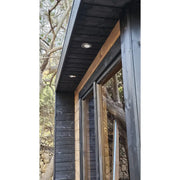 Leil Patio S Gartensauna 4 Personen mit schwarzer Holzfassade, Glastür und moderner LED-Beleuchtung im Garten