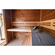 Leil Patio S Plus Gartensauna Innenraum mit Holzbänken und Saunaofen