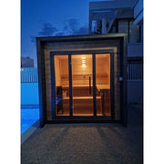 Leil® Patio XS Gartensauna von Leil® Saunas mit beleuchteter Holzinnenraum und Glastüren in modernem Gartendesign