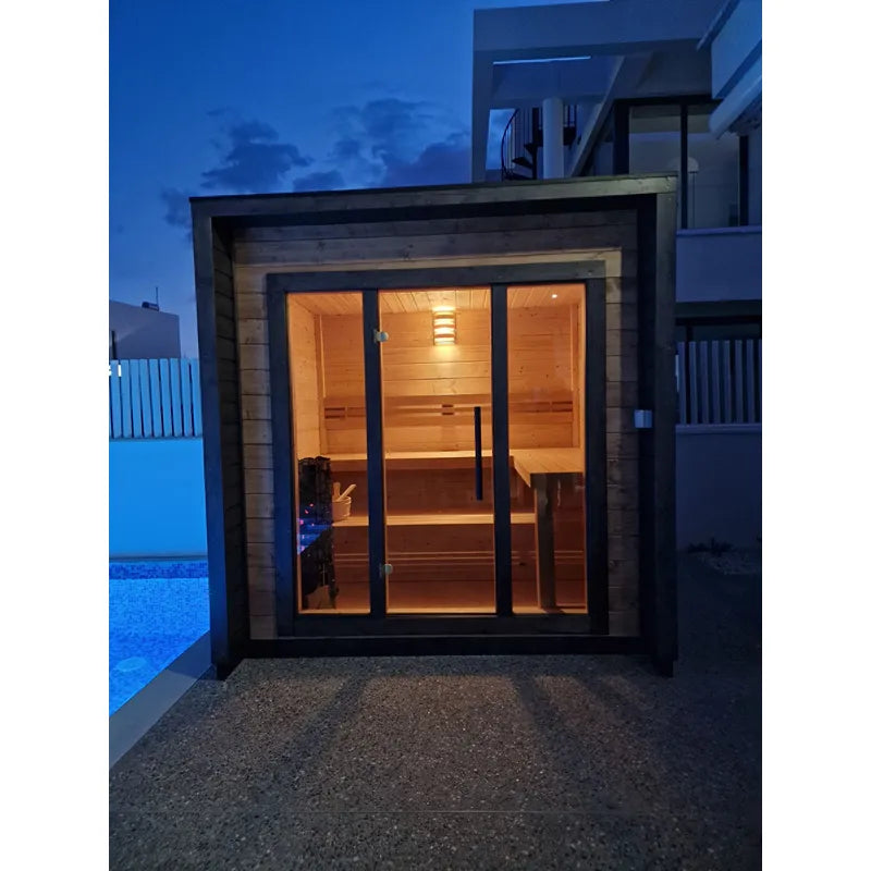 Leil® Patio XS Gartensauna von Leil® Saunas mit beleuchteter Holzinnenraum und Glastüren in modernem Gartendesign