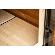 Leil® Patio XXS Gartensauna von Leil® Saunas – Innenraum mit Holzfußboden und Saunabänken
