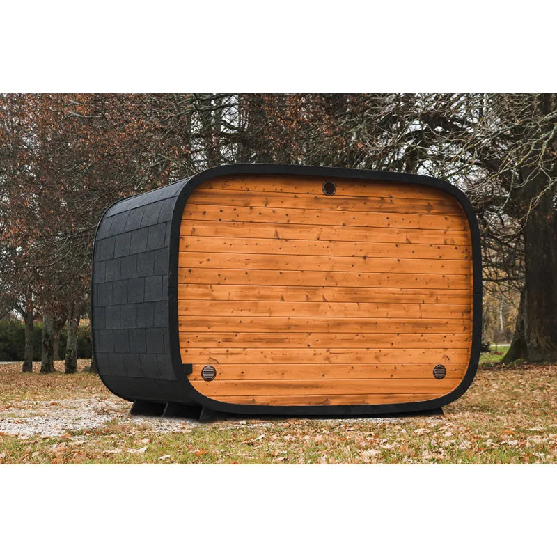 Leil® Round Cube Double Premium Gartensauna 2 Räume mit rundem Design, schwarzem Rahmen und orange Holzfassade im Garten