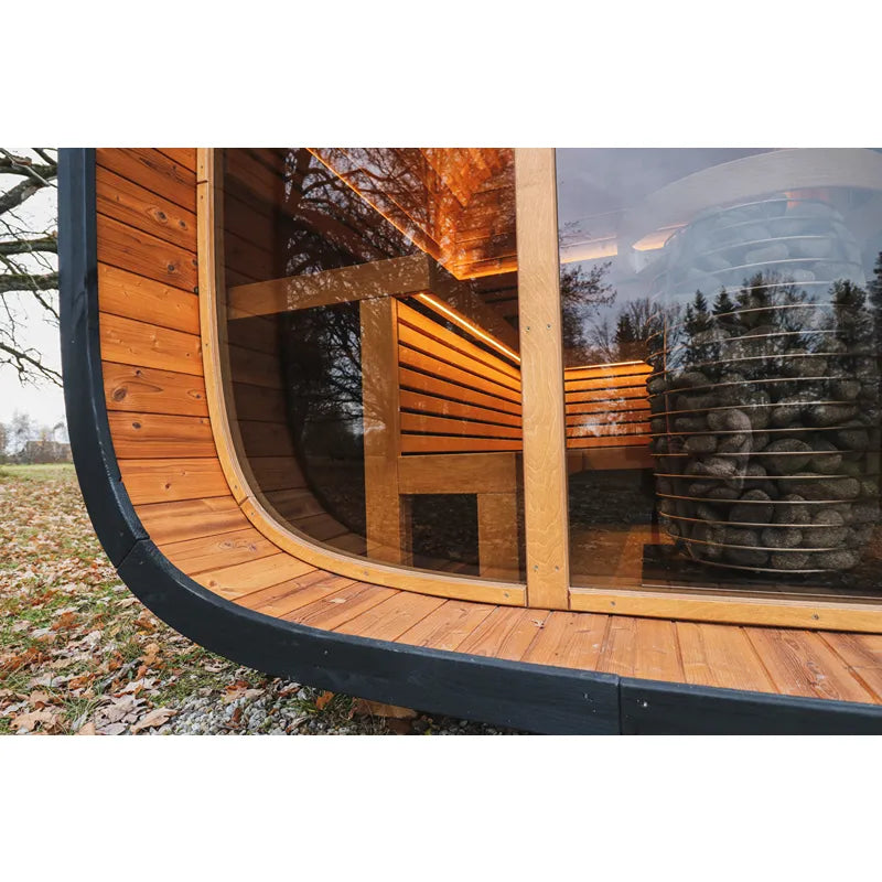 Leil® Round Cube Double Premium Gartensauna 2 Räume mit Holzverkleidung, Glaselementen und Holzbänken im Garten