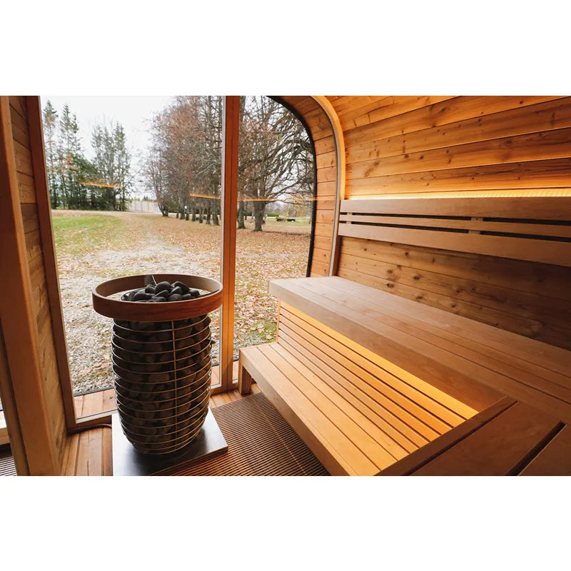 Leil® Round Cube Double Premium Gartensauna 2 Räume Innenraum mit Holzbänken und rundem Saunaofen