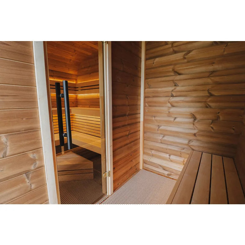 Leil® Round Cube Double Premium Gartensauna 2 Räume von Leil® Saunas mit Holzinnenraum, Bänken und offener Tür