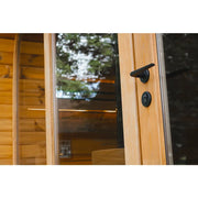 Leil® Round Cube Double Premium Gartensauna mit geöffneter Tür, Holzrahmen und schwarzen Griffen, Gartenblick
