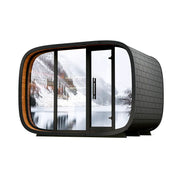 Leil® Round Cube Double Premium Gartensauna 2 Räume mit schwarzem Außengehäuse, orangefarbenen Akzenten und großen Panoramafenstern
